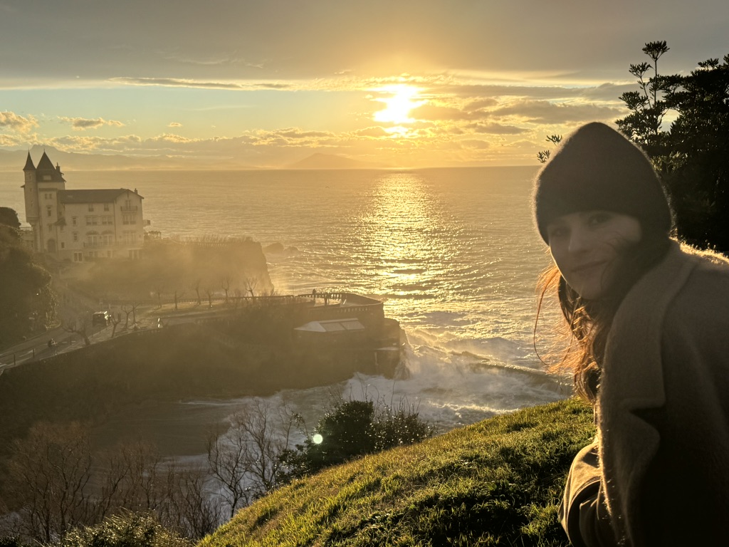 Amanda overlooking the Biarritz coast at sunset