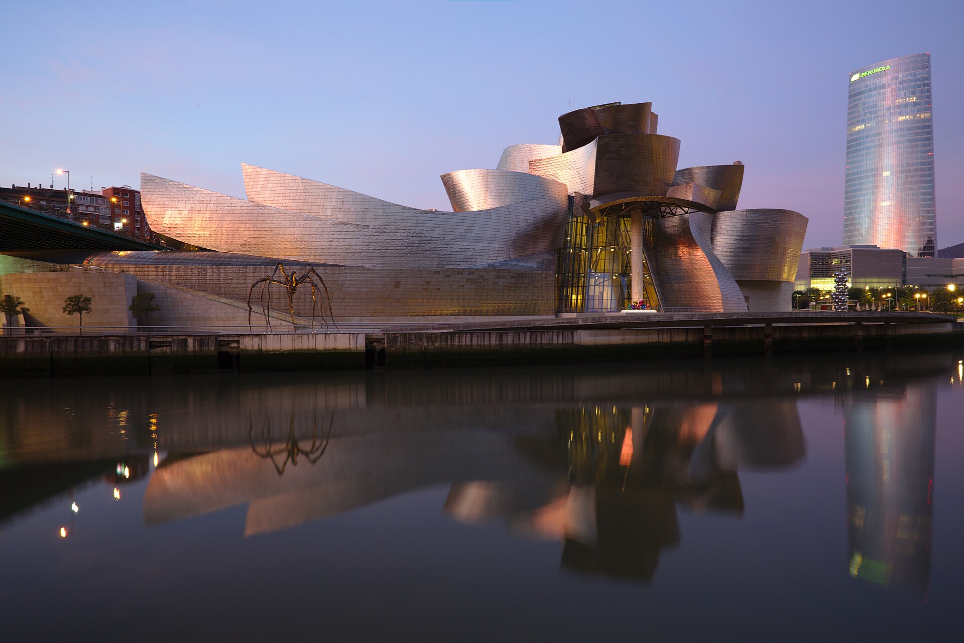 The Guggenheim Museum Bilbao reflected in the river in the early morning